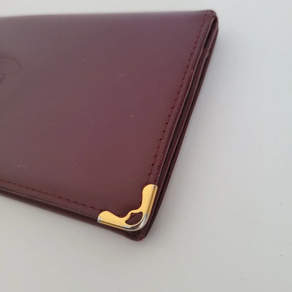 Cartier Must de Cartier Burgundy Leather Long Bifold Wallet Gold Corners Italy